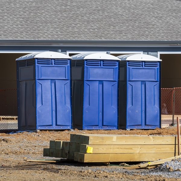 what is the cost difference between standard and deluxe portable restroom rentals